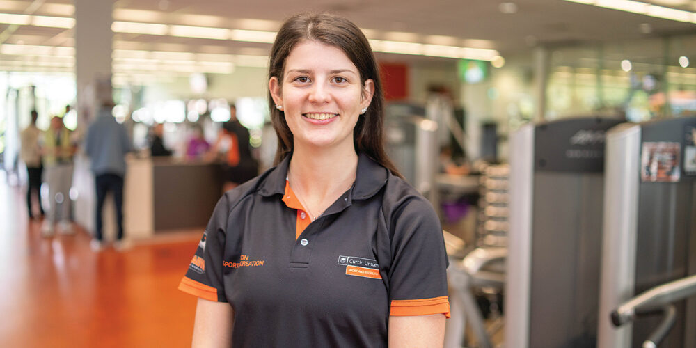 Trainer Jess Loxton standing in the Curtin Stadium gym