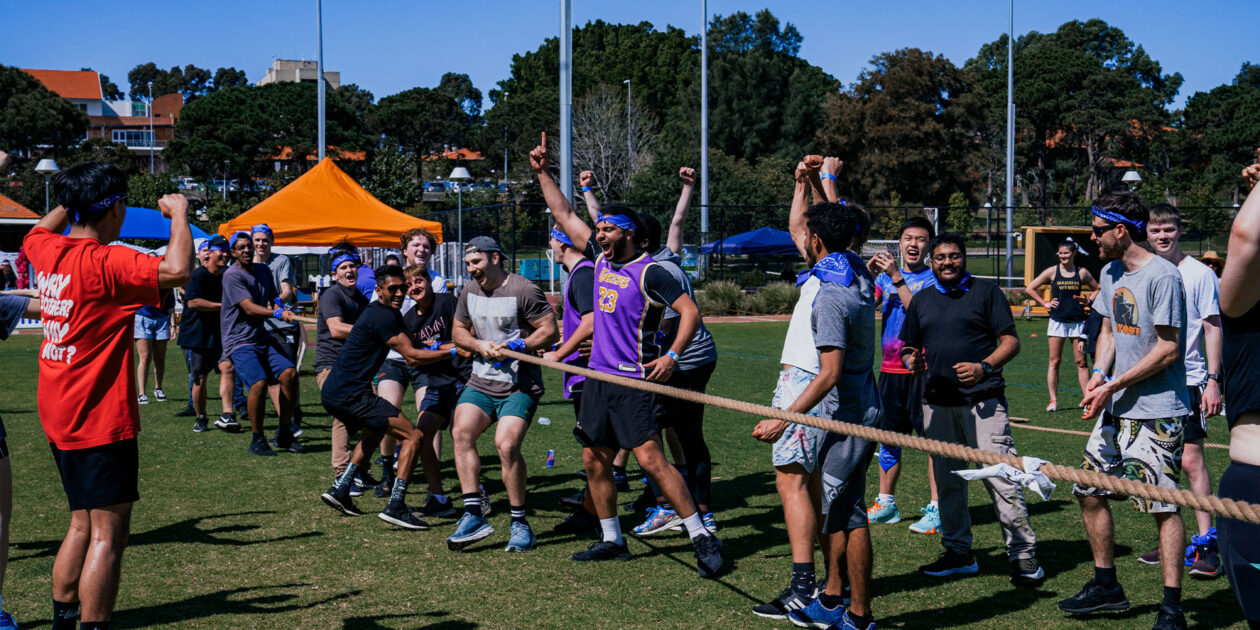 Students celebrate victory in a game of tug-of-war